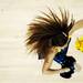 A Michigan cheerleader spins during a timeout in the game against Indiana on Sunday, March 10. Daniel Brenner I AnnArbor.com
